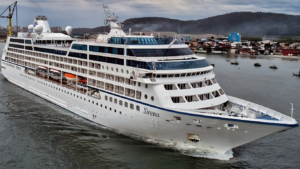 Premium cruise ship arriving at port for guided shore tours and cultural experiences
