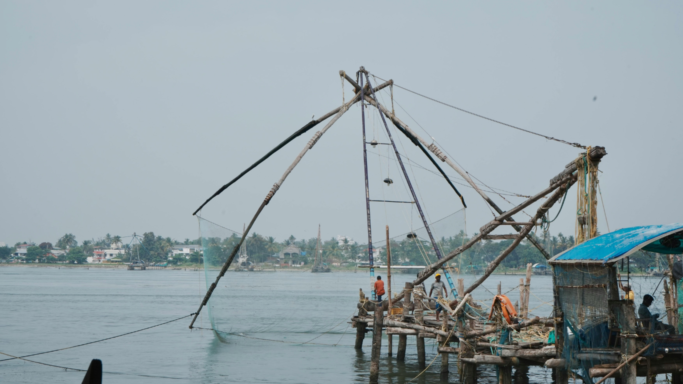 Traditional Chinese fishing nets along Goan riverbanks