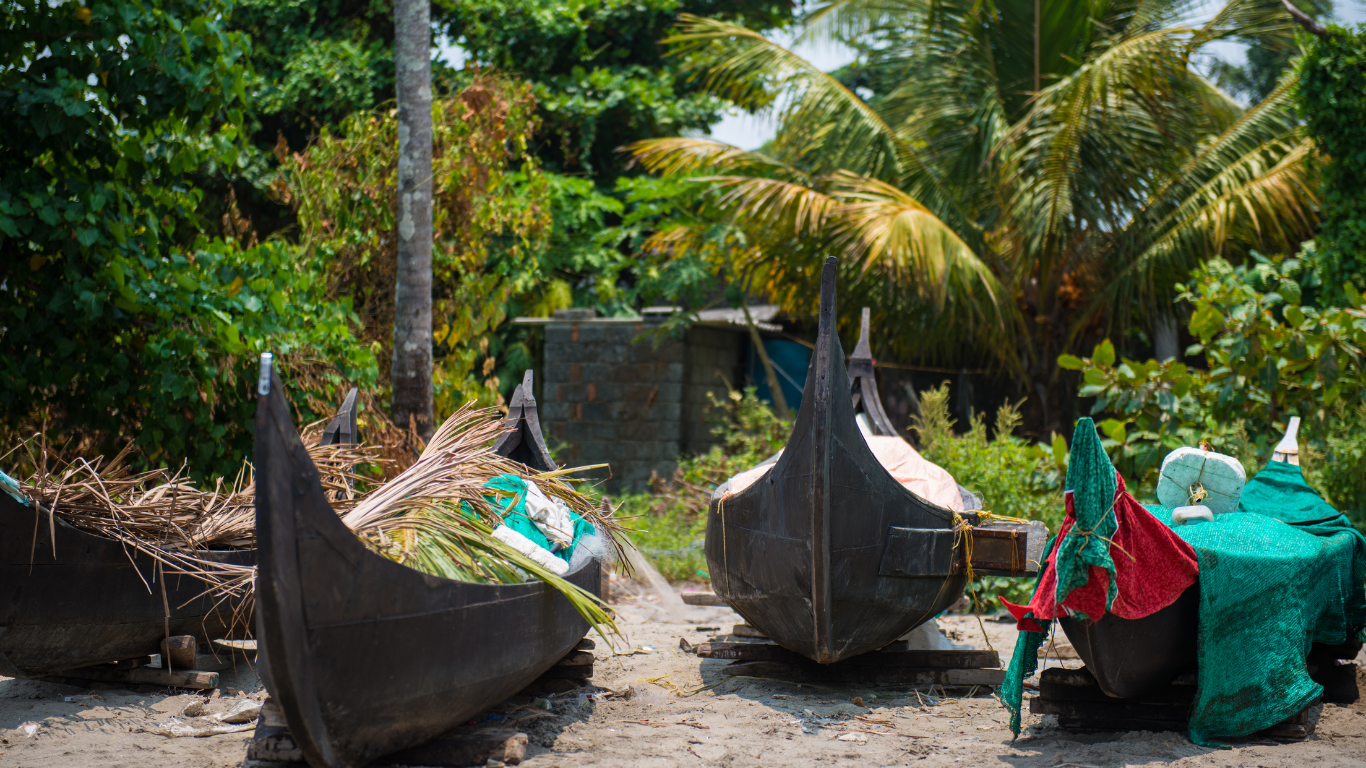 Traditional Kerala wooden fishing boats in Fort Kochi coastal village