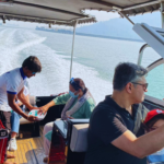 Premium speedboat transfer from Mumbai to Elephanta Caves with international travelers enjoying a fast and comfortable 20-minute journey across Mumbai Harbour
