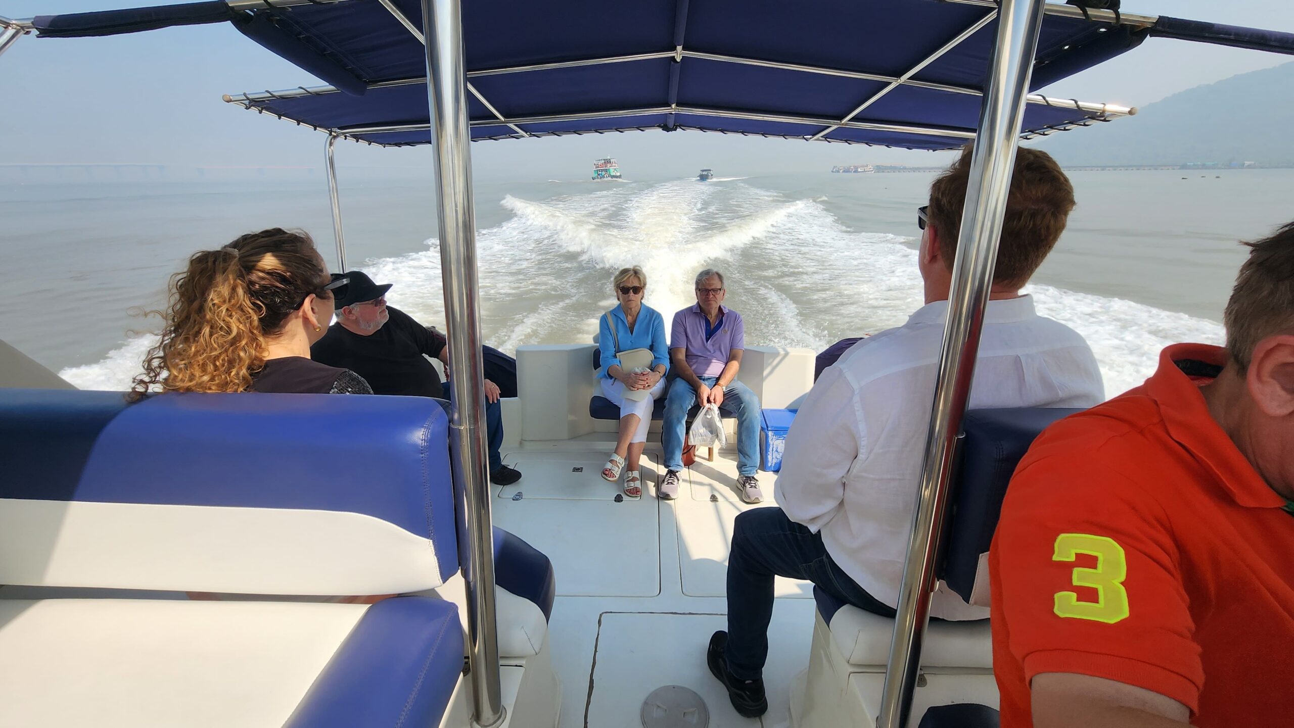 Travelers enjoying a speedboat to Elephanta Caves from Mumbai across the Arabian Sea